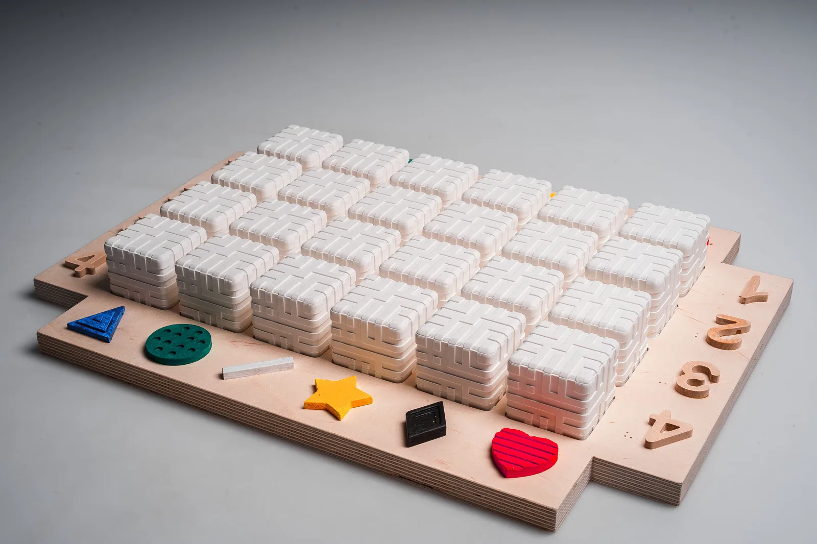 A photo of the visually impaired project board and all the cubes inside the board.